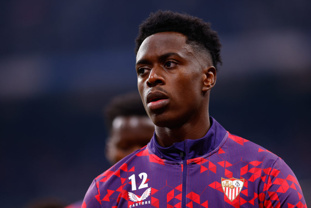 Albert Sambi Lokonga warms up for Sevilla.