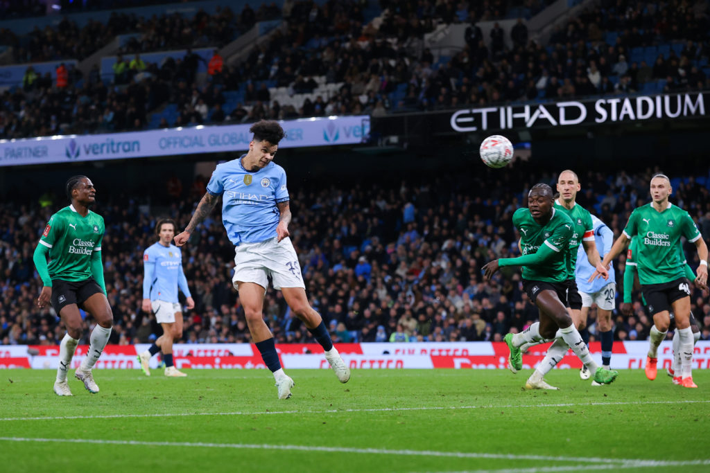 Nico O'Reilly of MAnchester City scores their side's first goal during the Emirates FA Cup Fifth Round match between Manchester City and Plymouth Argyle at Etihad Stadium on March 01, 2025