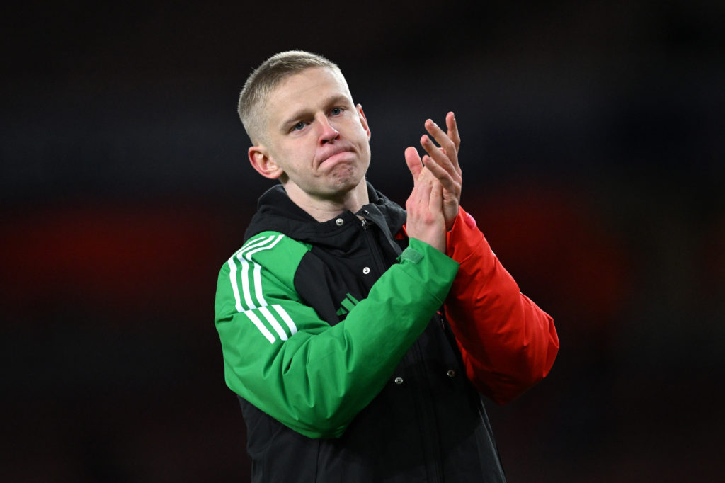 Oleksandr Zinchenko of Arsenal applauds the fans of PSV Eindhoven after the UEFA Champions League 2024/25 Round of 16 Second Leg match between Arsenal FC and PSV at Arsenal Stadium on March 12, 2025