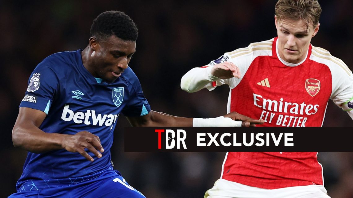 LONDON, ENGLAND - DECEMBER 28: Mohammed Kudus of West Ham United controls the ball whilst under pressure from Martin Odegaard of Arsenal during the...