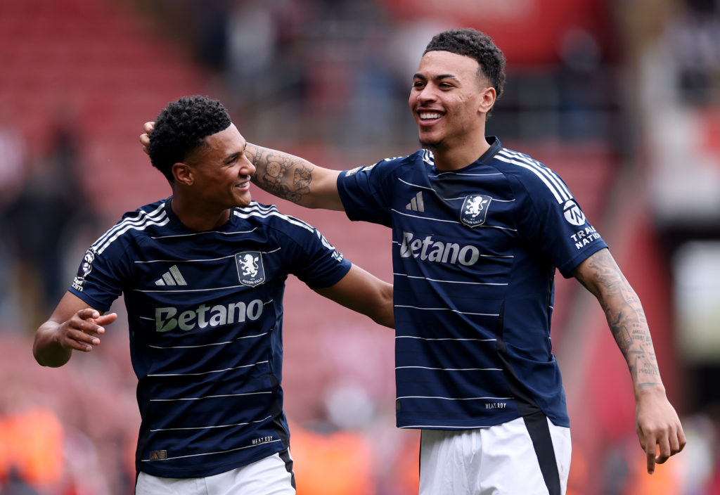Morgan Rogers celebrates with Ollie Watkins during a Premier League match for Aston Villa.