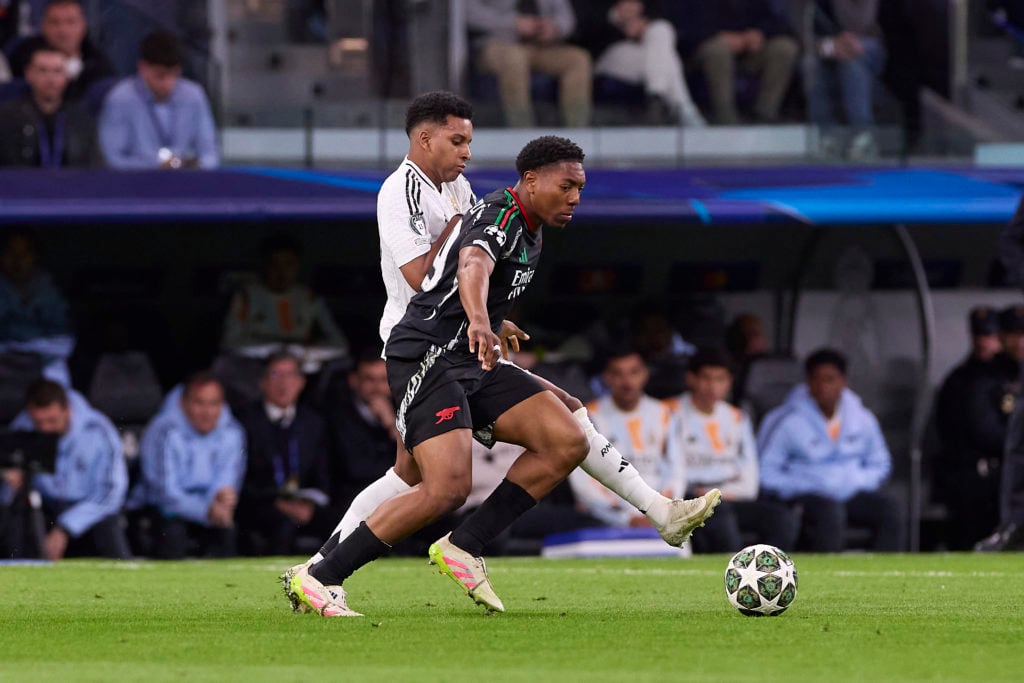 Myles Lewis-Skelly (R) of Arsenal FC and Rodrygo Goes (L) of