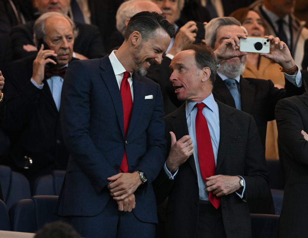 Josh Kroenke and Tim Lewis at Arsenal's Champions League match.