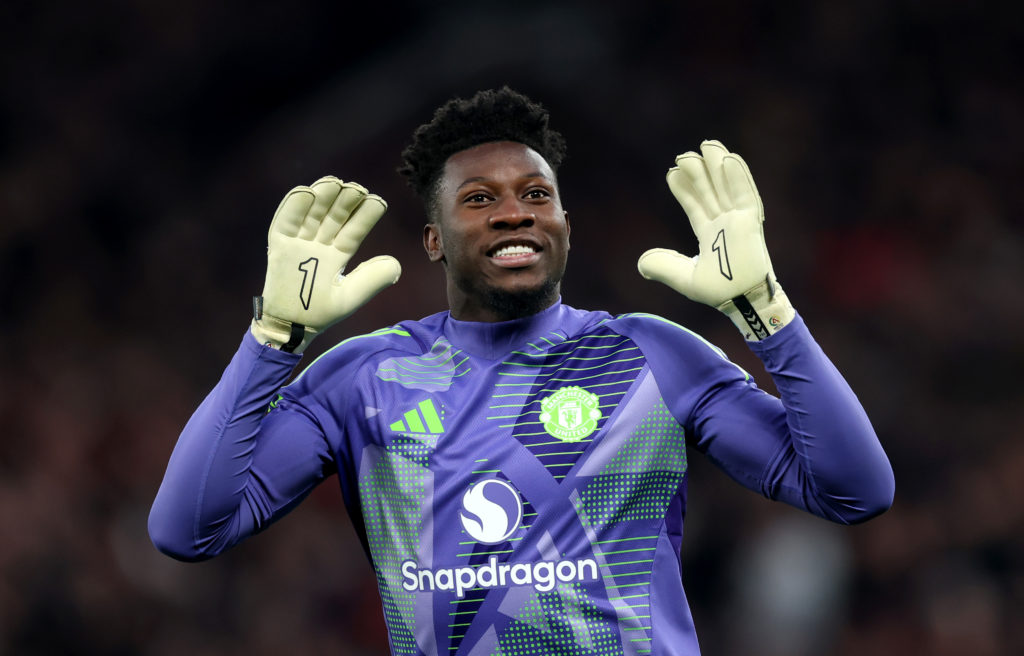 Andre Onana smiling at the Man United fans