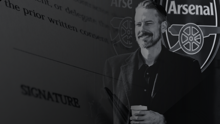A black-and-white composite image of Josh Kroenke standing in front of the Arsenal badge, with a generic image of a contract in the background
