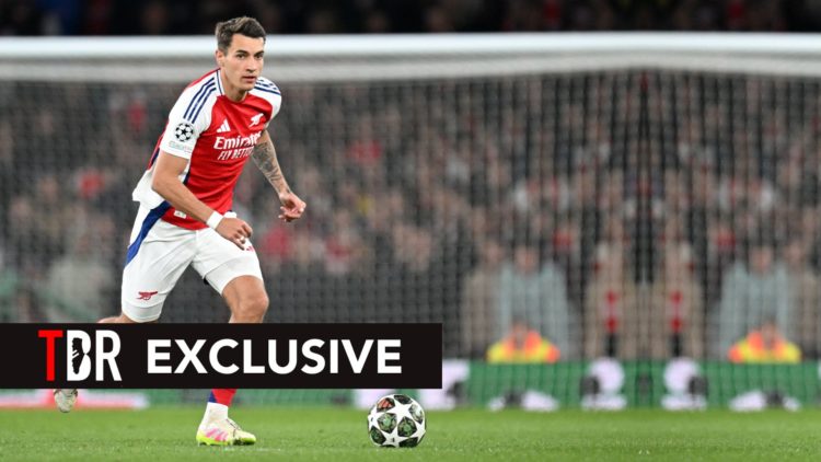 Jakub Kiwior of Arsenal runs with the ball during the UEFA Champions League 2024/25 Quarter Final First Leg match between Arsenal FC and Real Madri...