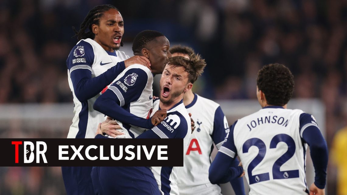 Image of Tottenham Hotspur players celebrating with a TBR Exclusive Banner