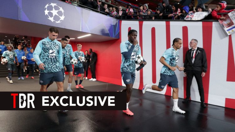 Castello Lukeba and Xavi Simons of RB Leipzig walk to the pitch with their teammates for their warm up prior to start the UEFA Champions League 202...