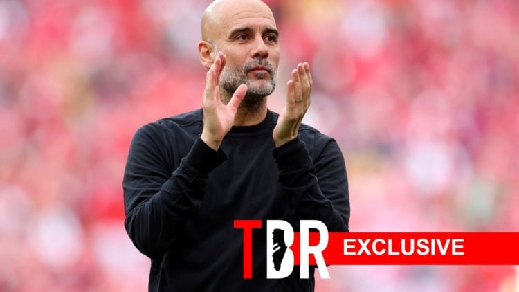 Pep Guardiola applauds after Manchester City's win at Wembley.