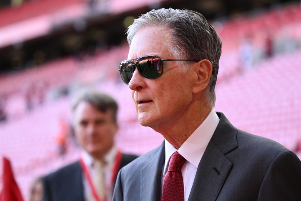Liverpool's US owner John W. Henry leaves his seat after the English Premier League football match between Liverpool and Bournemouth at Anfield in Liverpool,