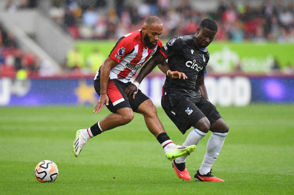 Bryan Mbeumo of Brentford challenges for the ball with Marc Guehi of Crystal Palace