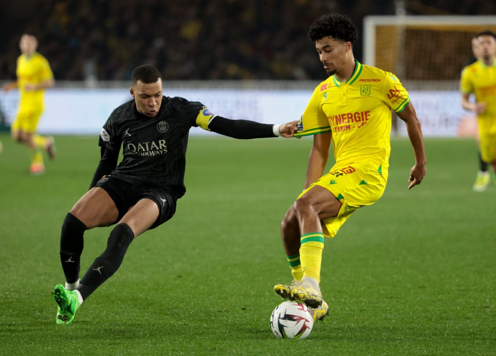 Kylian Mbappe of PSG, Nathan Zeze of Nante in action during the Ligue 1 Uber Eats match between FC Nantes (FCN) and Paris Saint-Germain (PSG) at Stade de la Beaujoire on February 17, 2024
