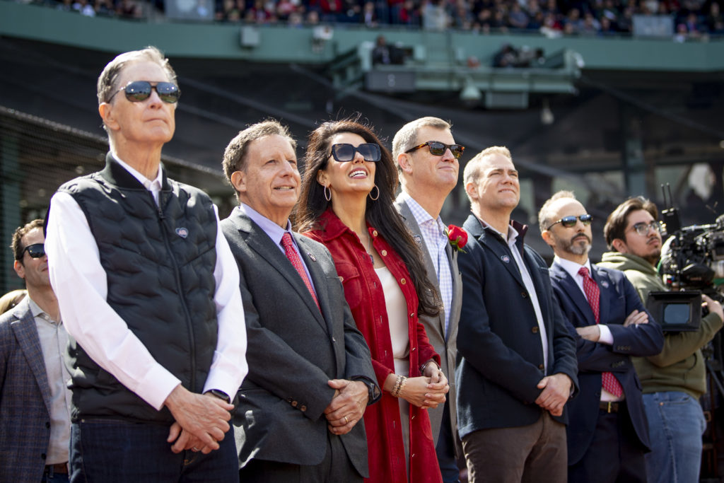 FSG and Liverpool owners John Henry, Tom Werner and Mike Gordon line up at a Boston Red Sox game