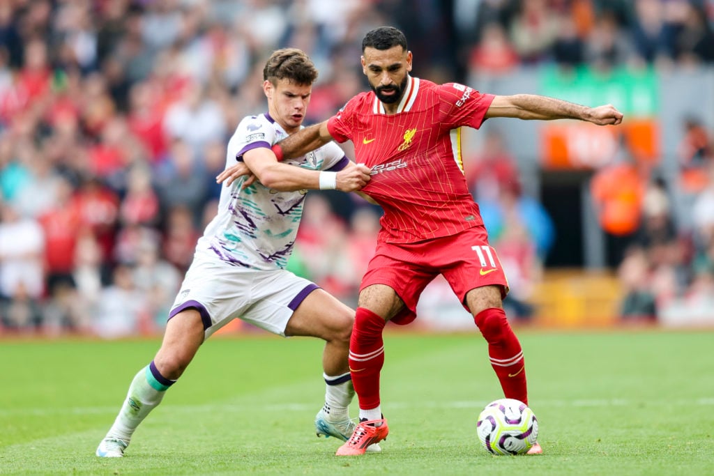 Bournemouth's Milos Kerkez up against Liverpool's Mohamed Salah in the Premier League.