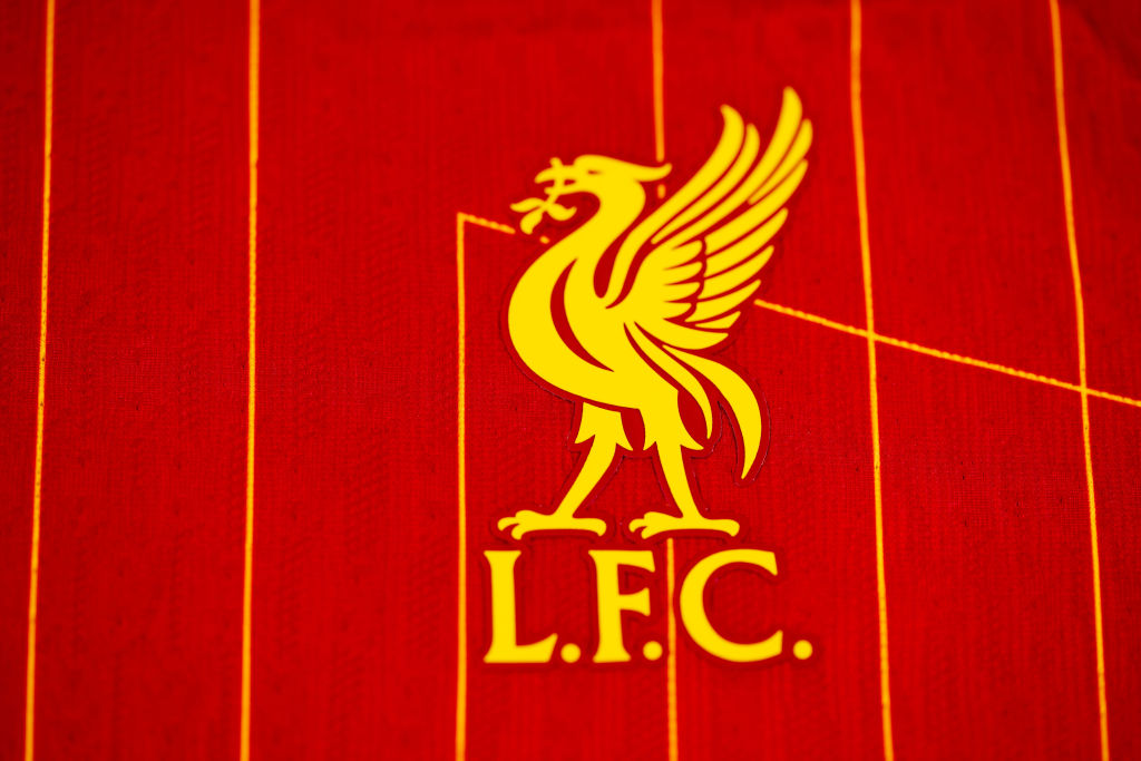 The Liverpool badge displayed on their 2024-25 home kit, closeup shot