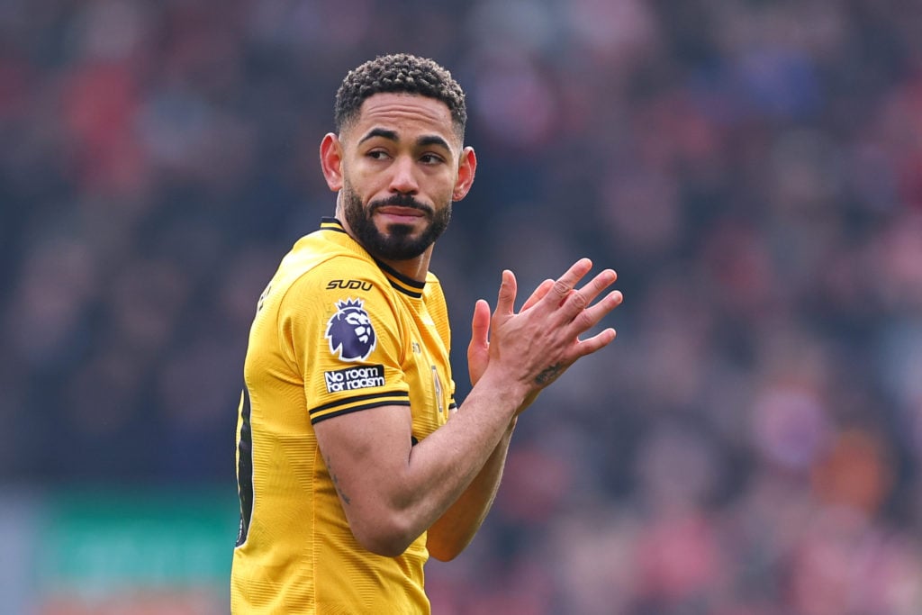 Matheus Cunha looks on during a Premier League clash between Wolves and Liverpool at Anfield.
