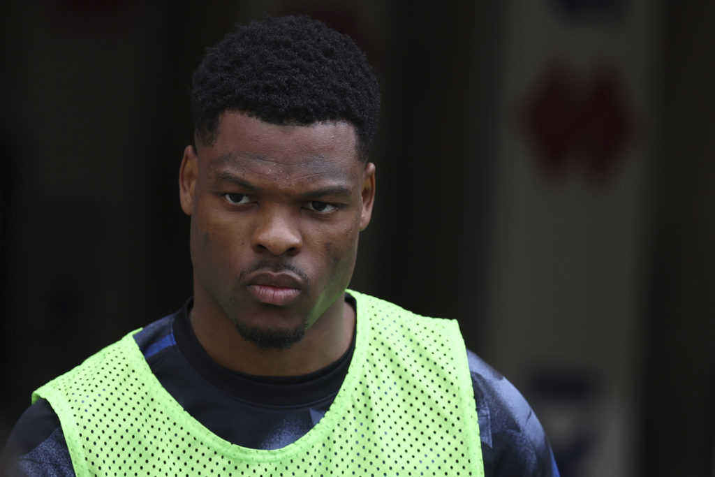 Denzel Dumfries looks on from the sidelines during Inter Milan vs Torino