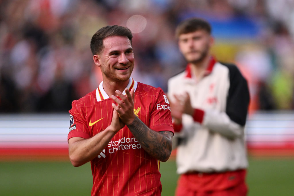 Alexis Mac Allister applauds fans after Liverpool draw vs Arsenal.