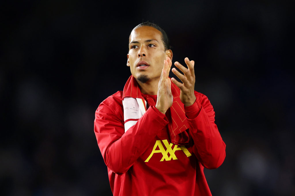 Virgil van Dijk applauds the fans after Liverpool's defeat to Brighton.