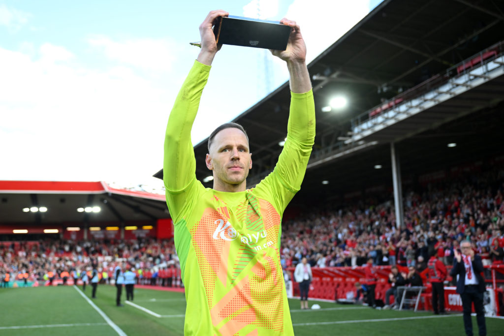 Nottingham Forest goalkeeper Matz Sels lifts the 2024/25 Premier League Golden Glove award