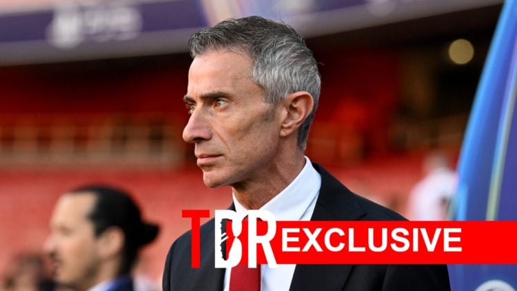 Image of Arsenal sporting director Andrea Berta before a game at the Emirates Stadium, overlaid a TBR Exclusive banner