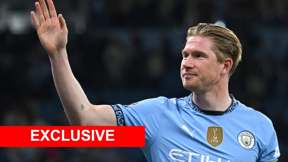 Image of Kevin De Bruyne waves at the Manchester City fans