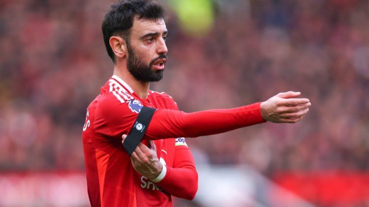 Bruno Fernandes adjusting his black armband during match against Crystal Palace