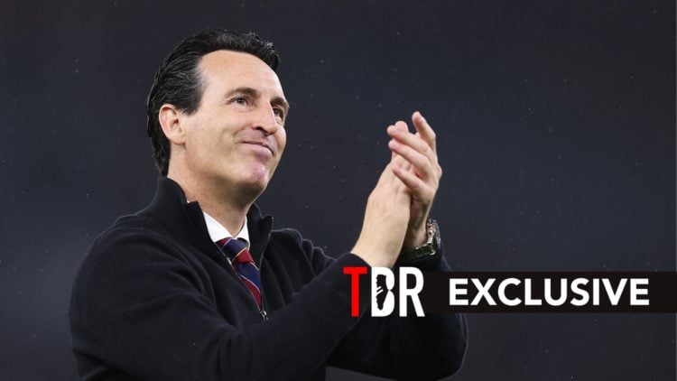 Unai Emery applauds Aston Villa fans after a Premier League match.