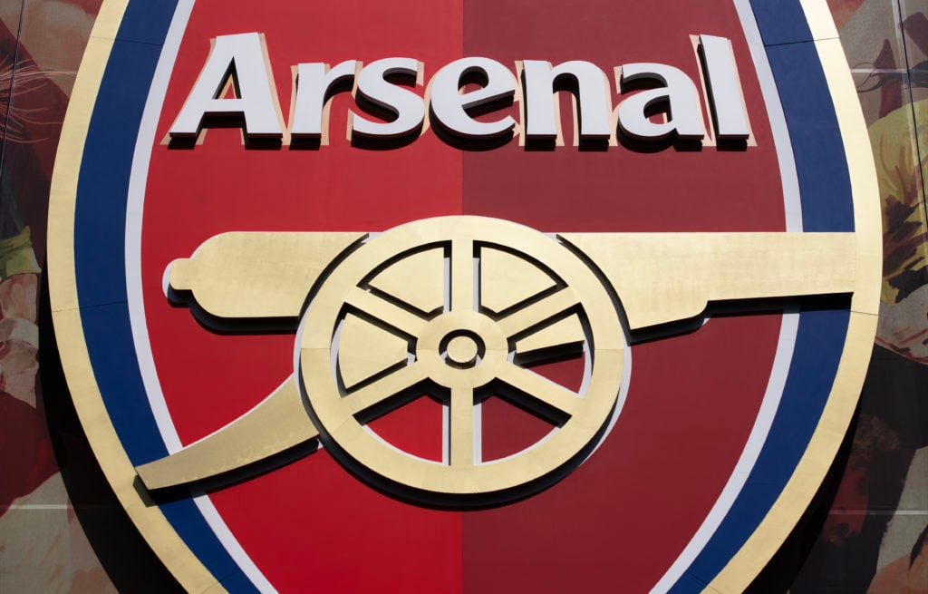 Arsenal badge on the side of the Emirates stadium