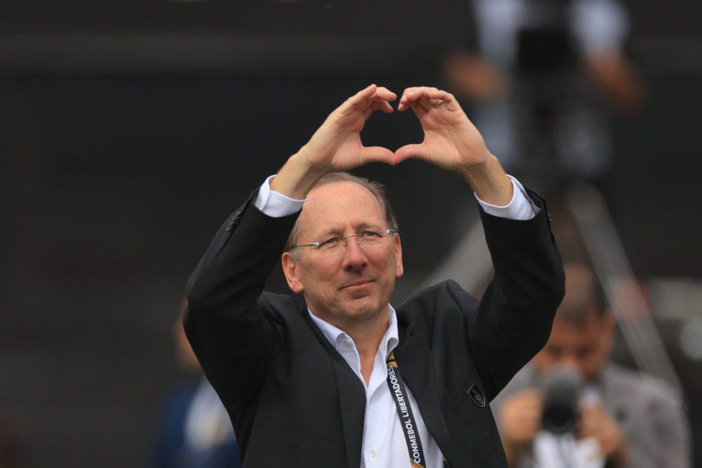 Crystal Palace co-owner John Textor makes a love-heart sign with his hands as he attends a match of one of his other clubs, Botafogo