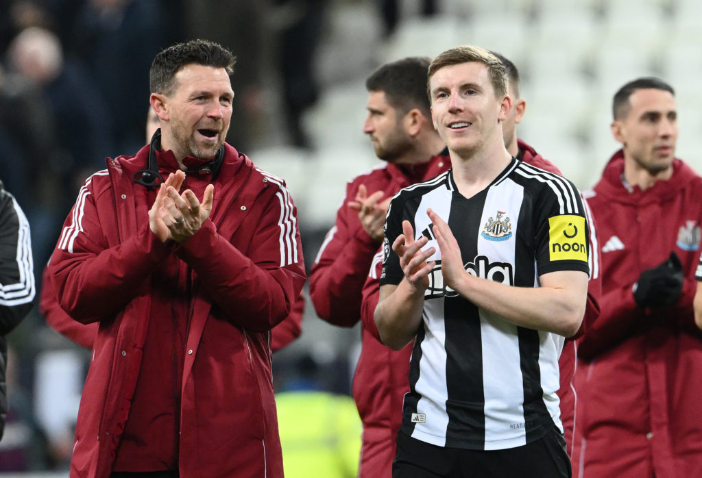 Matt Targett applauds Newcastle United's fans.