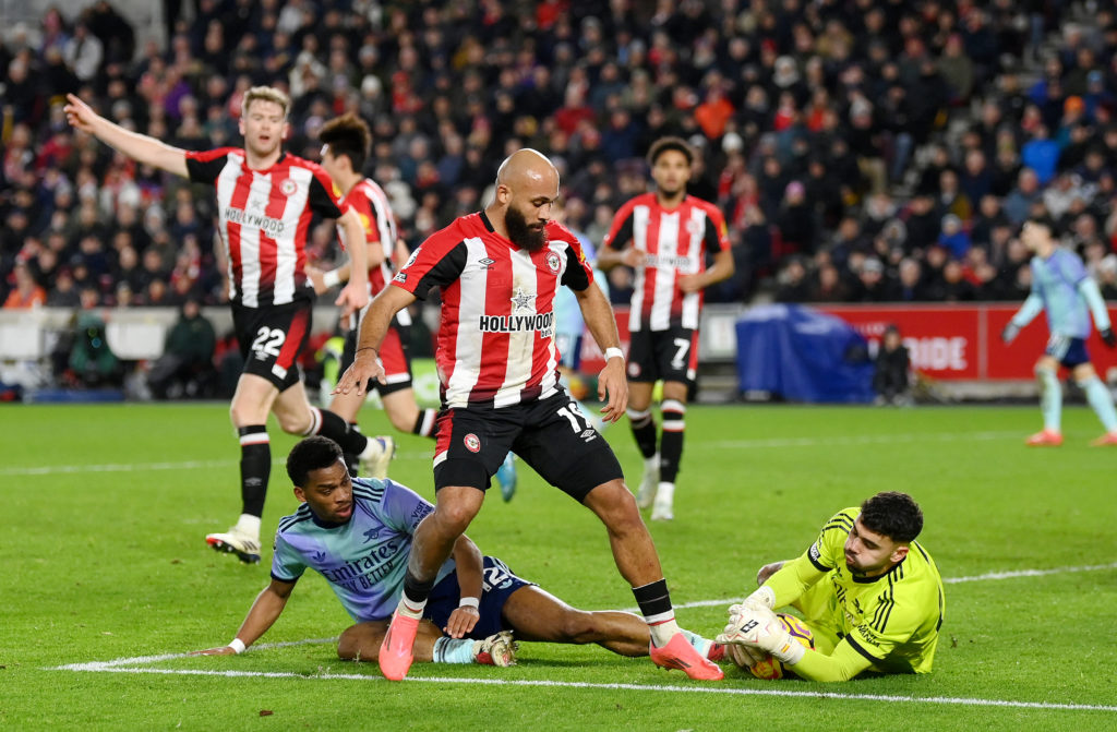 Bryan Mbeumo tackles David Raya during Brentford vs Arsenal in the Premier League.