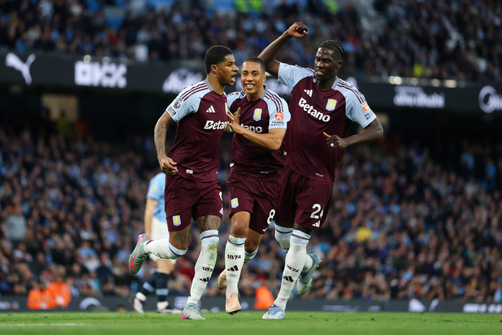 Amadou Onana celebrates with Marcus Rashford for Aston Villa.