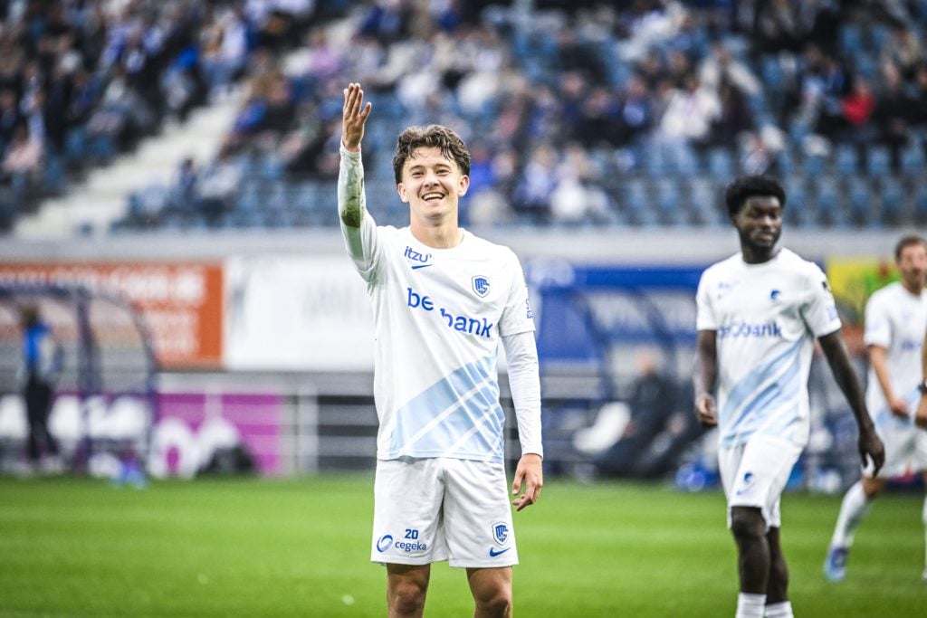 Genk midfielder Konstantinos Karetsas smiling and gesturing during a Belgian Pro League game