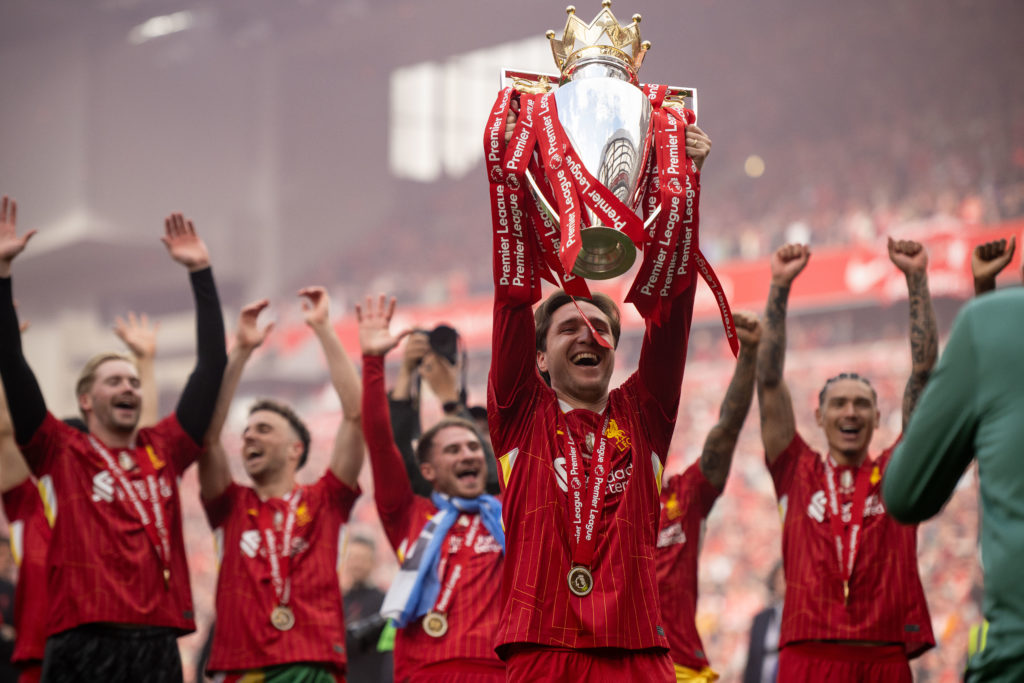 Federico Chiesa lifting the Premier League trophy at Liverpool