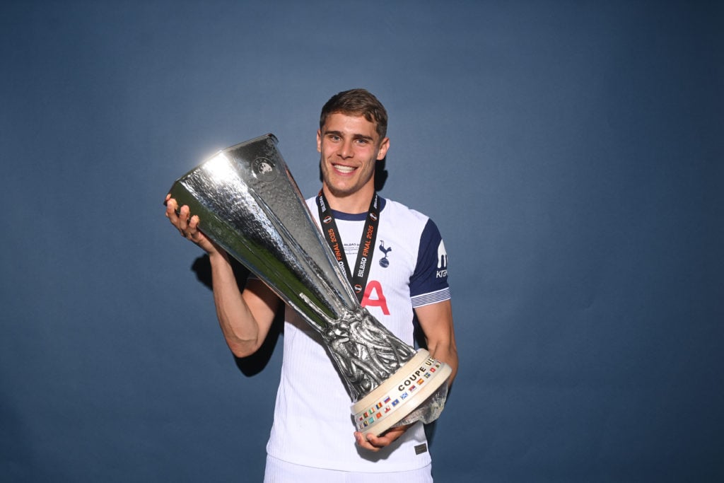 Micky van de Ven of Tottenham Hotspur poses for a photo with the UEFA Europa League Trophy at the winners shoot after the UEFA Europa League final between Tottenham and Manchester United.