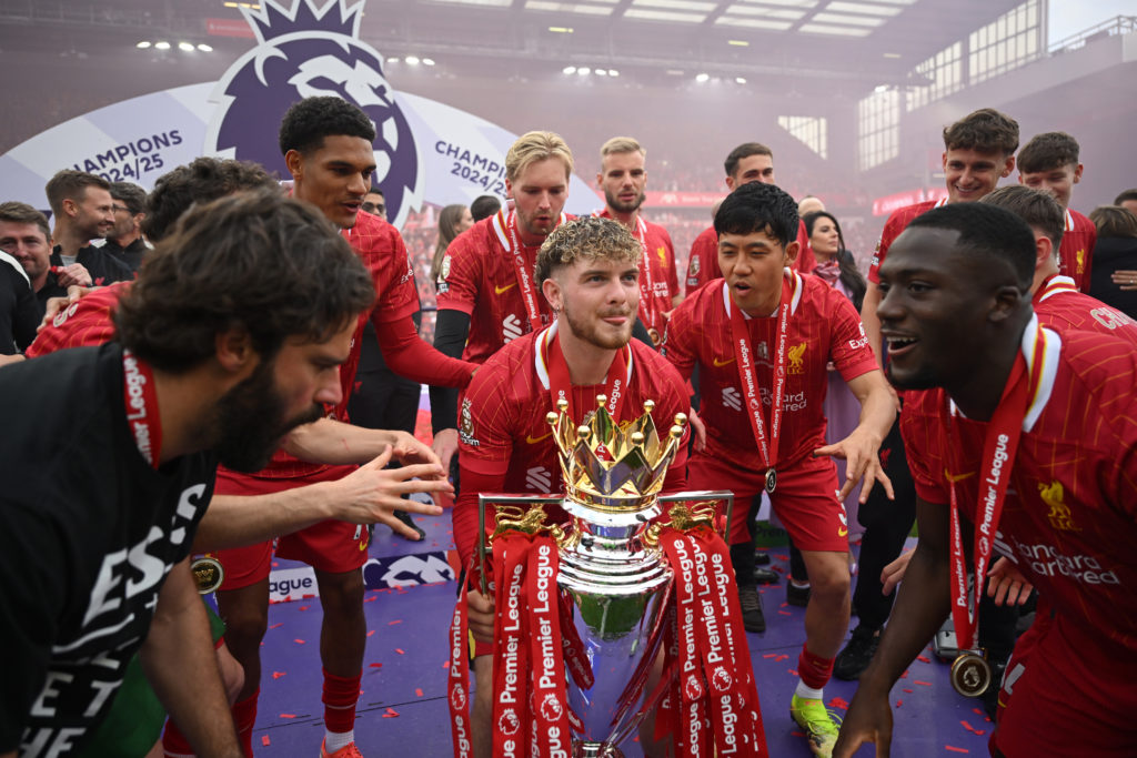 Harvey Elliott lifting the Premier League trophy