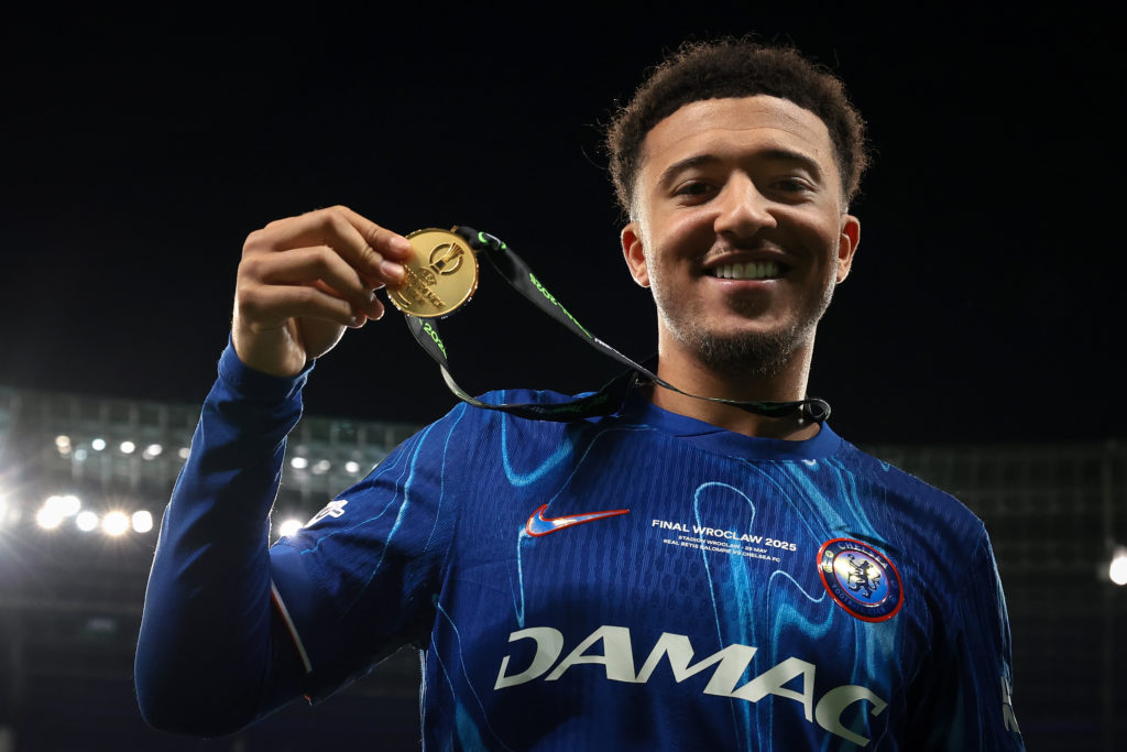 Jadon Sancho poses with his winners medal after UEFA Champions League triumph