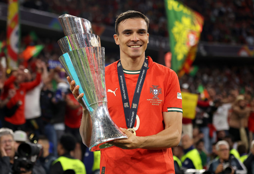 Joao Palhinha poses with the Nations League trophy after winning it with Portugal