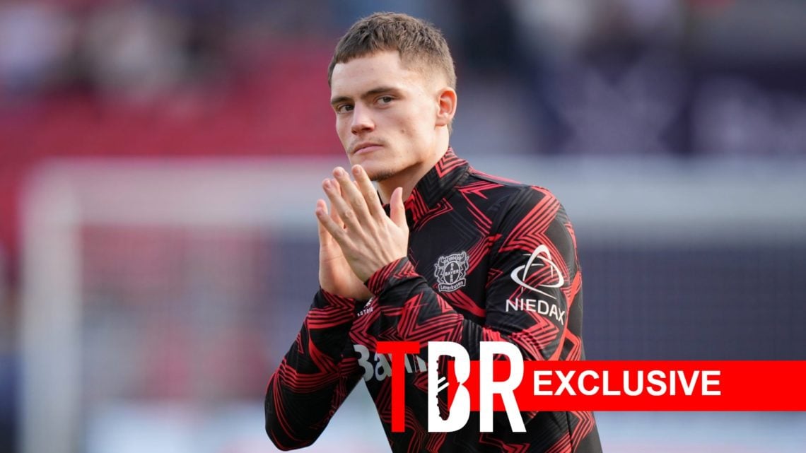 Image of Bayer 04 Leverkusen star Florian Wirtz applauding the fans prior to a game, overlaid a TBR Exclusive banner