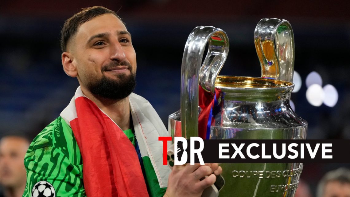 Gianluigi Donnarumma lifts the Champions League trophy with PSG.