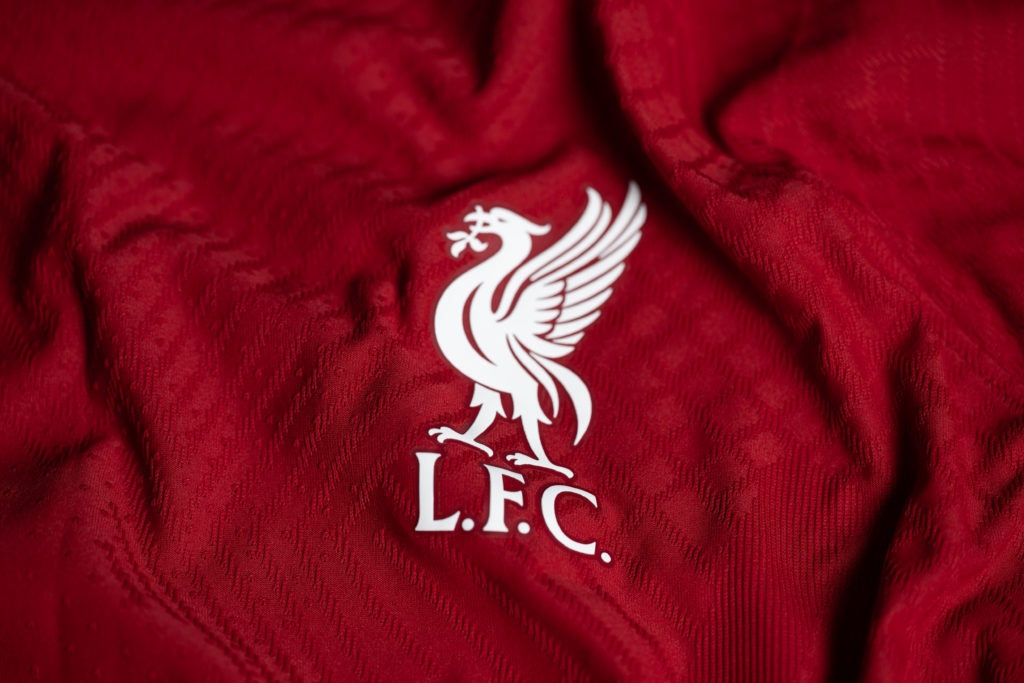 A closeup shot of the Liverpool badge on the home kit