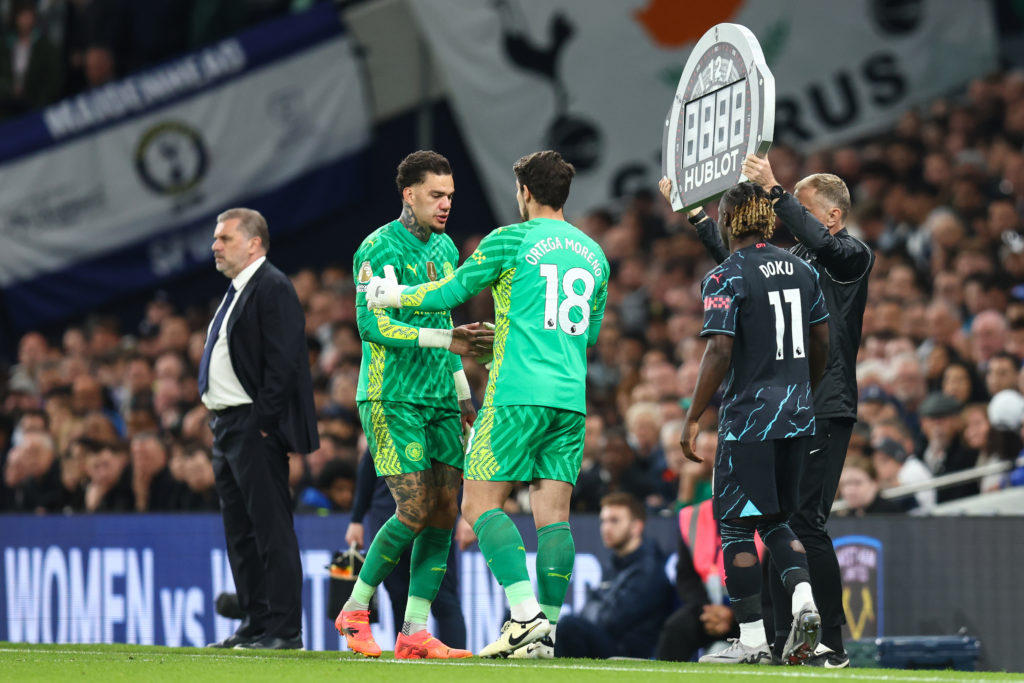 Manchester City goalkeeper Ederson is substituted off for Manchester City goalkeeper Stefan Ortega during the Premier League match between Tottenham Hotspur and Manchester City at Tottenham Hotspur Stadium on May 14, 2024