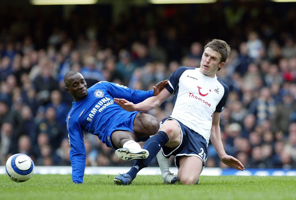 Michael Carrick of Tottenham Hotspur and Claude Makelele of Chelsea challenge during the Premier League match