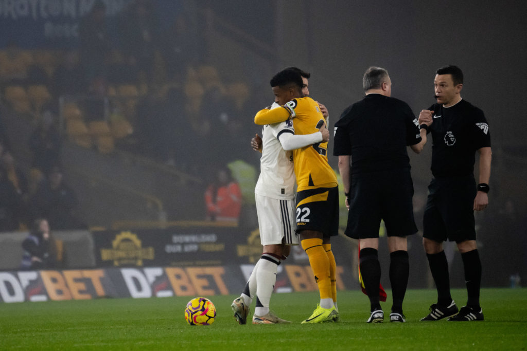 Bruno Fernandes and Nelson Semedo embrace