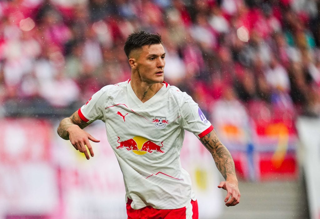 Benjamin Sesko of RB Leipzig looks on