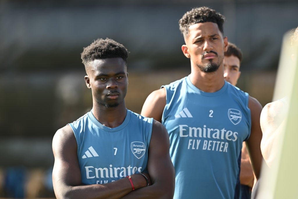 Bukayo Saka stands alongside William Saliba in Arsenal's pre-season training camp in Spain.