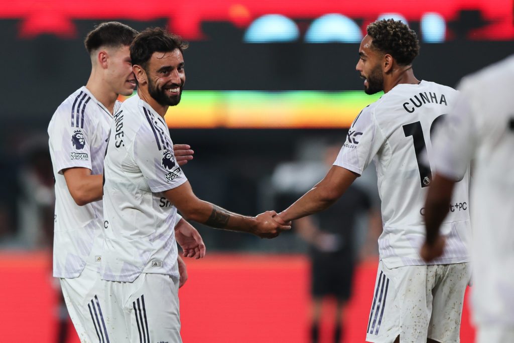 Manchester United midfielder Bruno Fernandes (8) celebrates with Manchester United Matteus Cunha
