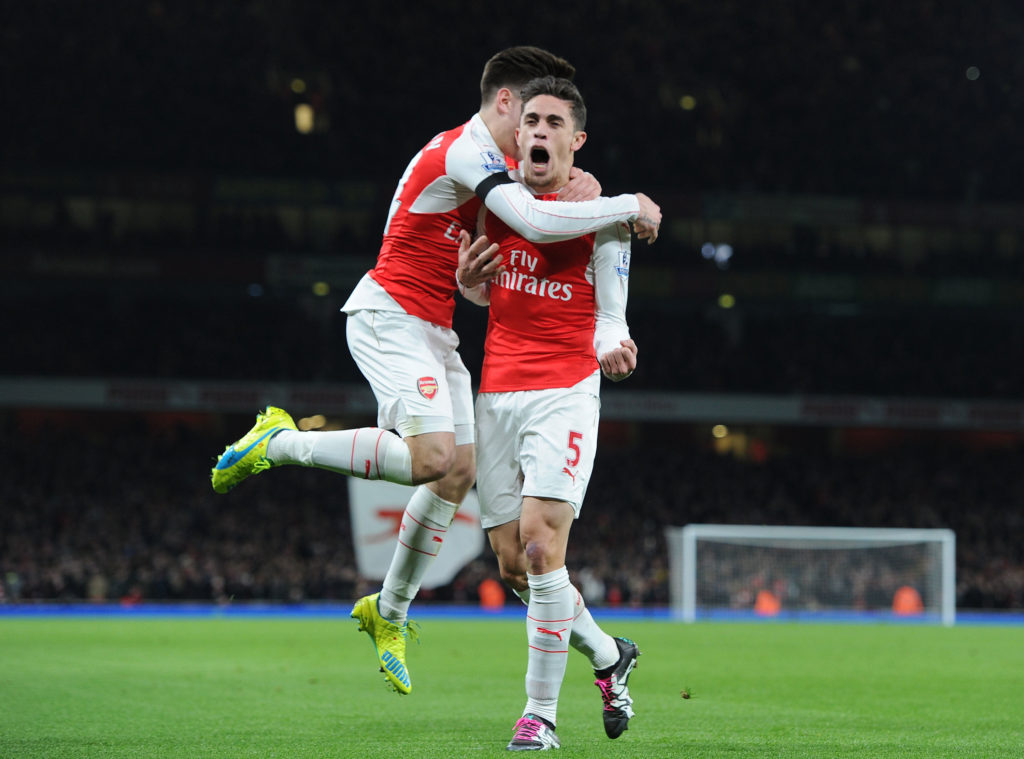 Gabriel Paulista celebrates scoring for Arsenal with Hector Bellerin during the Barclays Premier League match between Arsenal and A.F.C. Bournemouth at Emirates Stadium on December 28, 2015