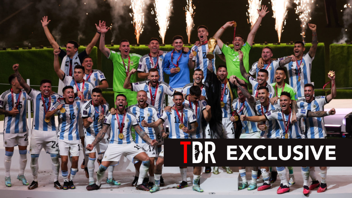 Image of Argentina players including Exequiel Palacios and Lionel Messi celebrating winning the 2022 FIFA World Cup in Qatar